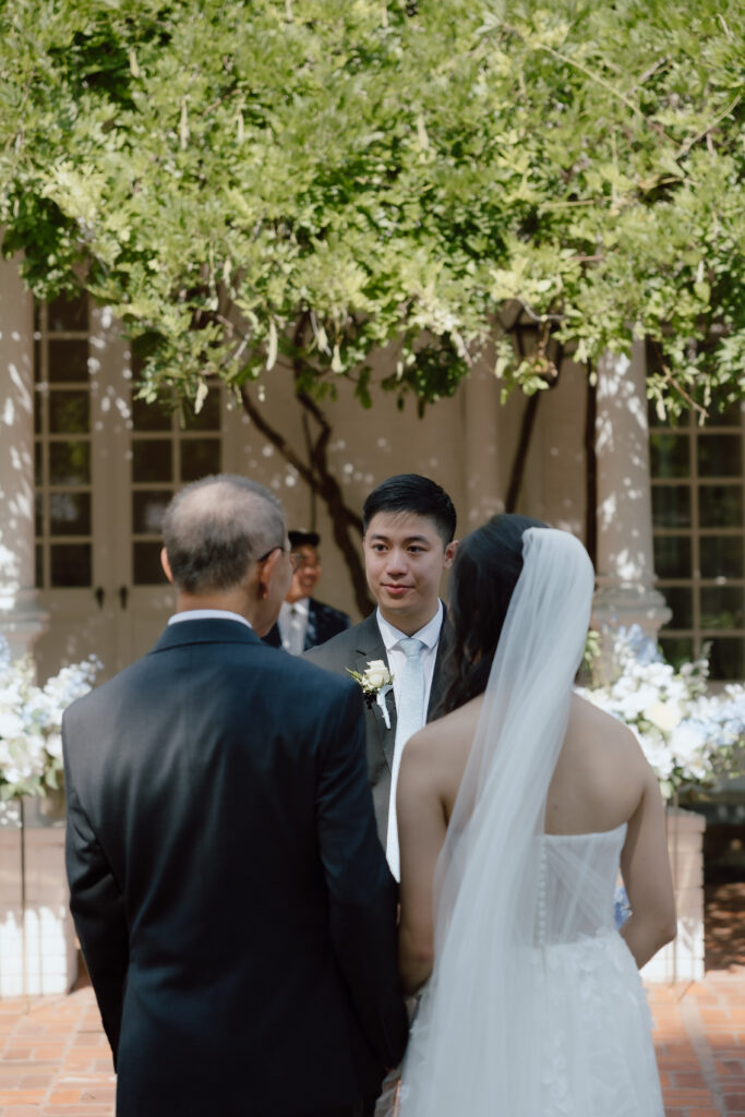 Lucinda’s dad walking her down the aisle at Woodbine Mansion wedding ceremony