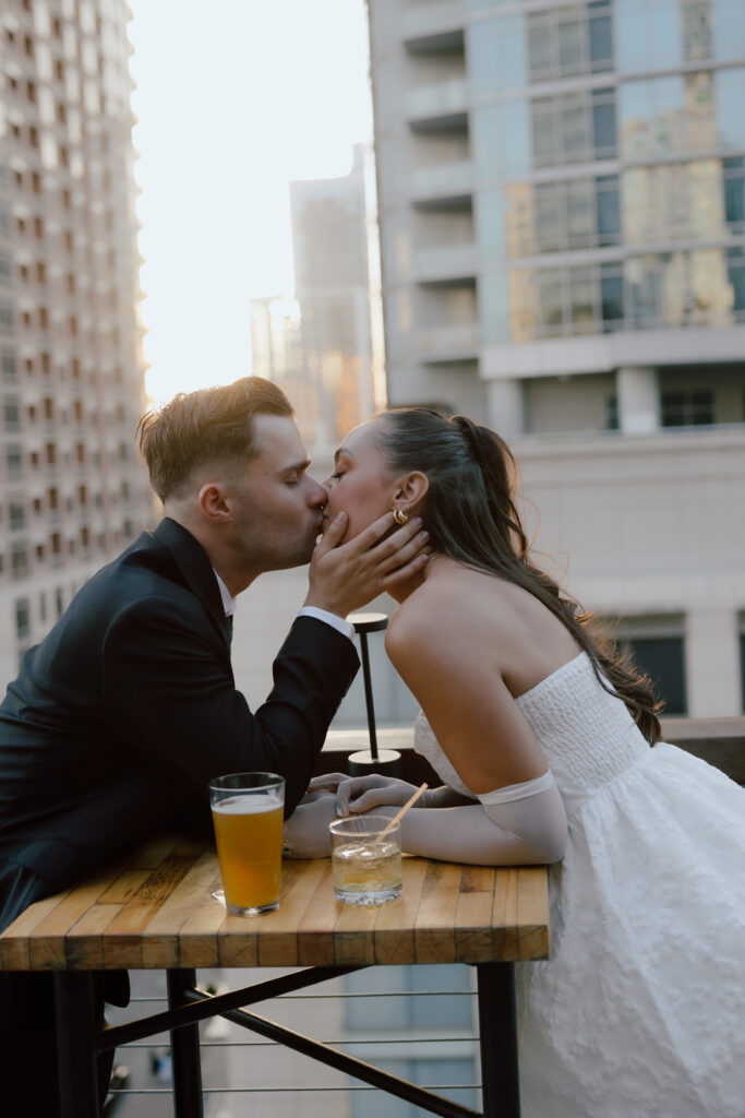 A quiet intimate moment shared between the couple during their rooftop engagement session in Austin
