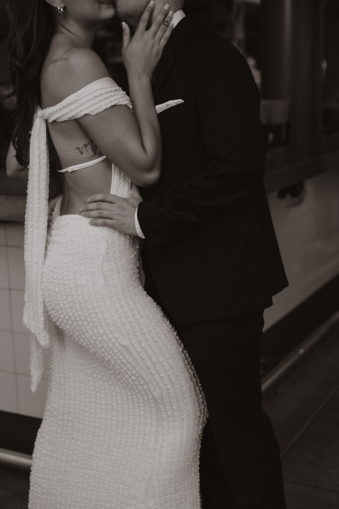 Close-up detail of the couple’s stylish outfits during their Austin engagement session capturing their connection and effortless vibe