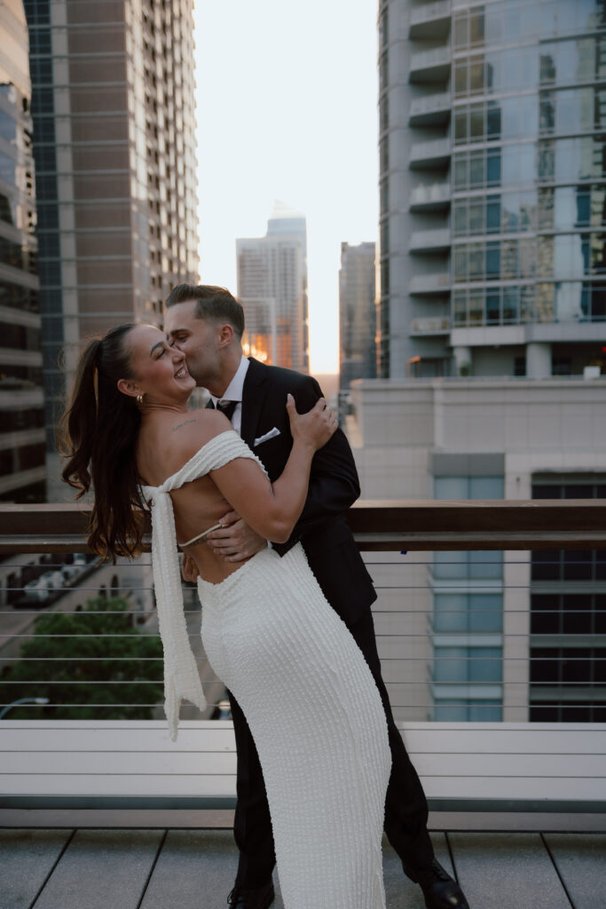 Rooftop Kiss between Marley and Jared as he sun sets