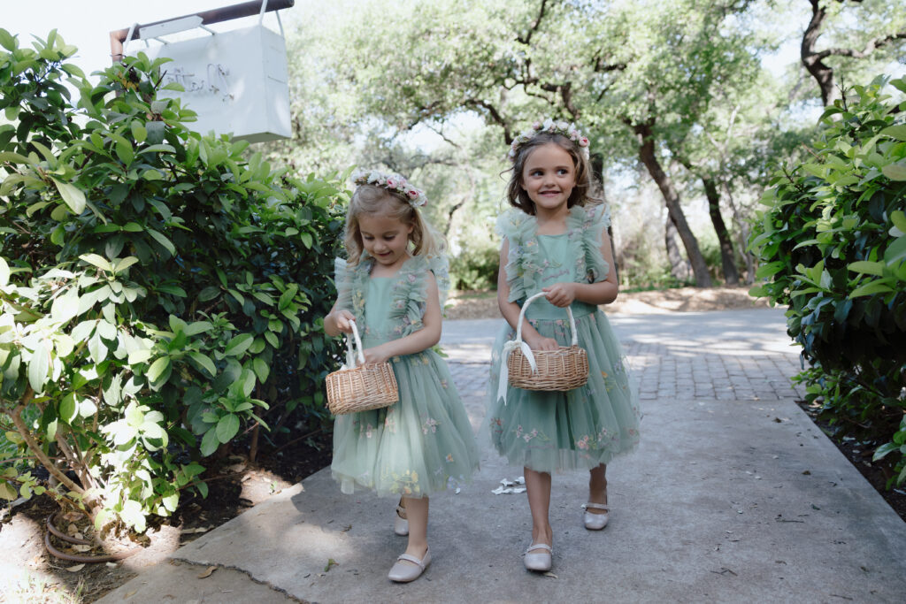 Flower girls carrying baskets